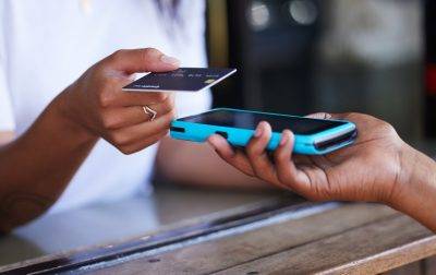 Tapping, Payment And Hands With A Credit Card And Machine To Pay For A Service At A Coffee Shop. Finance, Contactless Transaction And Woman Buying At A Cafe, Restaurant Or Shop With A Waiter