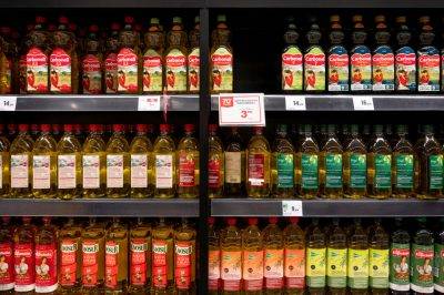 Bottles From The Spanish Cooking Oil And Olive Oil Brands